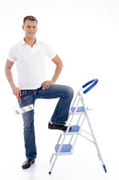 model posing with staircase against white background