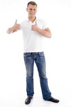 smiling male showing thumbs up on an isolated background