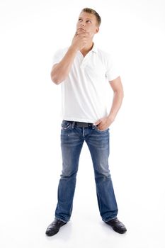 standing man in thinking pose on an isolated white background