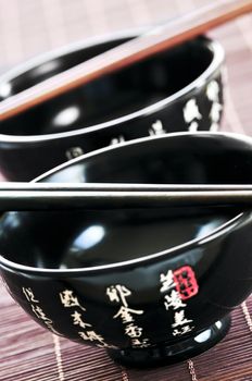 Two rice bowls and chopsticks close up