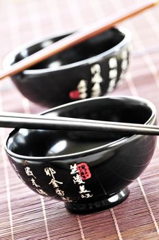 Two rice bowls and chopsticks close up