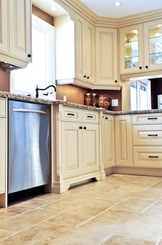 Modern luxury kitchen with ceramic tile floor