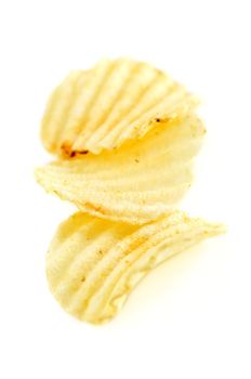 Several potato chips isolated on white background