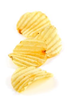 Several potato chips isolated on white background