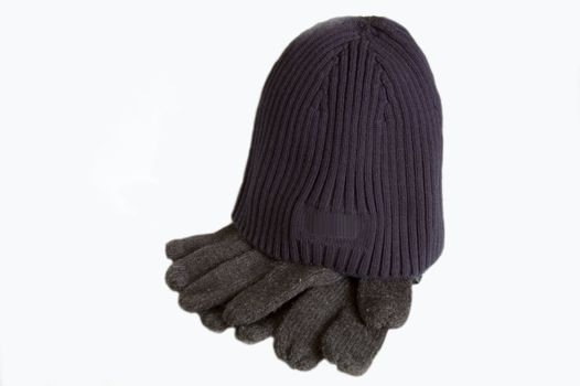 cap and gloves isolated on background