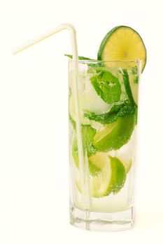 Drink with lime slices, ice and mint isolated on white