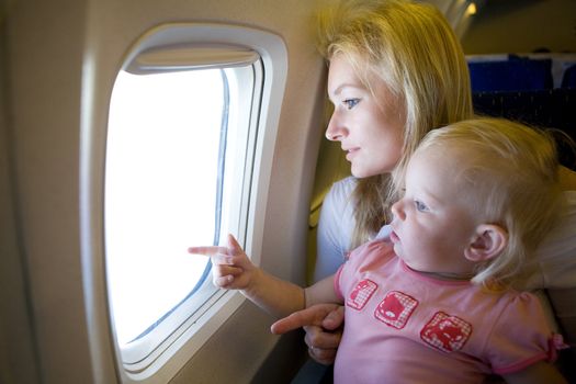 mom and child in the airplane