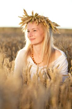 girl in field of wheat