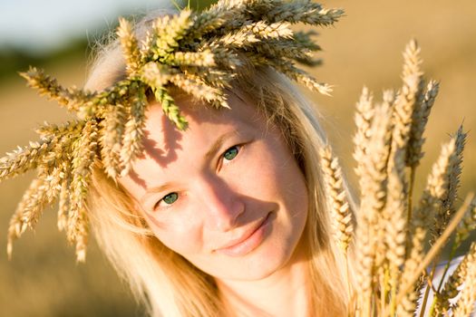 girl in field of wheat