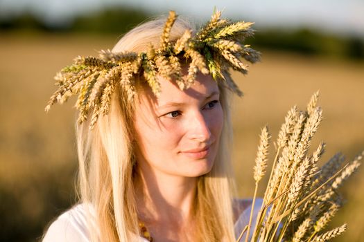 girl in field of wheat