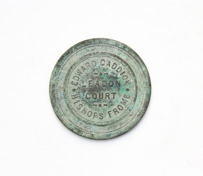 Historic coin, antique Bishops frome on white.