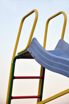 Closeup of a colorful slide with ladder