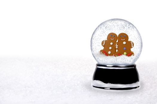 2 Happy Gingerbread People Inside a Snowglobe in Love on Christmas Holiday
