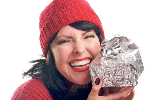 Attractive Woman Holds Holiday Gift Isolated on a White Background.