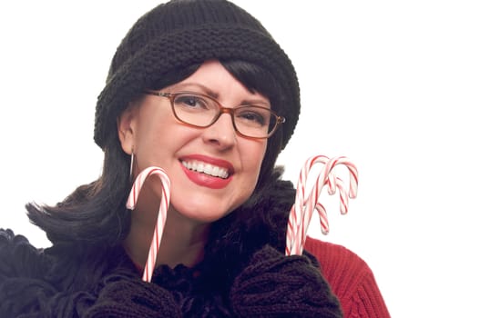 Attractive Woman Holds Candy Canes Isolated on a White Background.