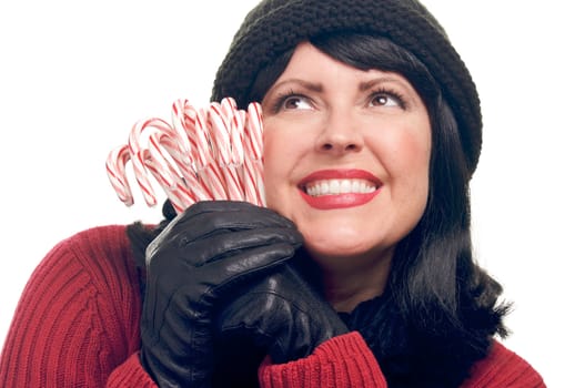 Attractive Woman Holds Candy Canes Isolated on a White Background.