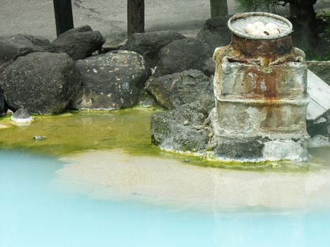 Chest of boiled eggs in a hot pond thermal, Beppu, Japan