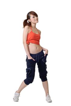 Portrait of athlete girl posing and standing on white background.