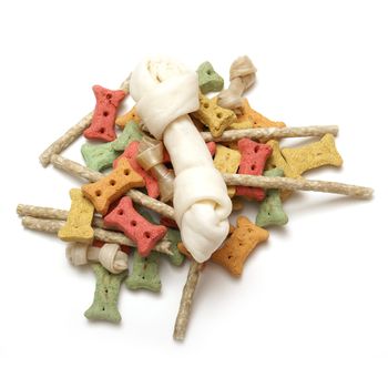 An isolated group of various dog treats.