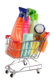 Cleaning equipment in a modell shopping trolley on white background