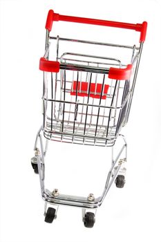 Red and silver shopping trolley on white background