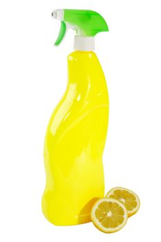 A yellow bottle of household cleaner spray with fresh lemons on bright background