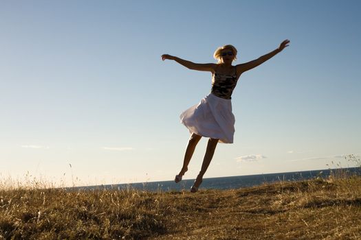 pretty blond jumping