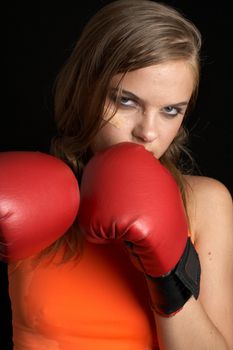 boxing girl in orange shirt