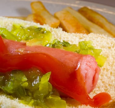 Hot Dog with relish on bun ready to eat or serve