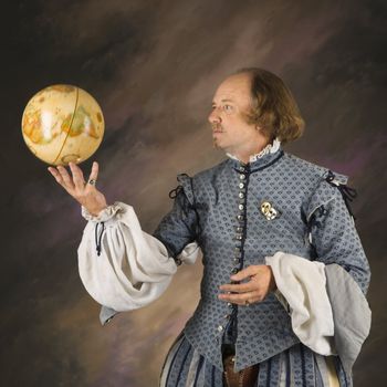 William Shakespeare in period clothing holding spinning globe.
