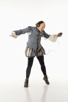 William Shakespeare in period clothing listening to mp3 player and dancing.