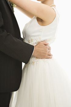 Close up of bride and groom dancing.