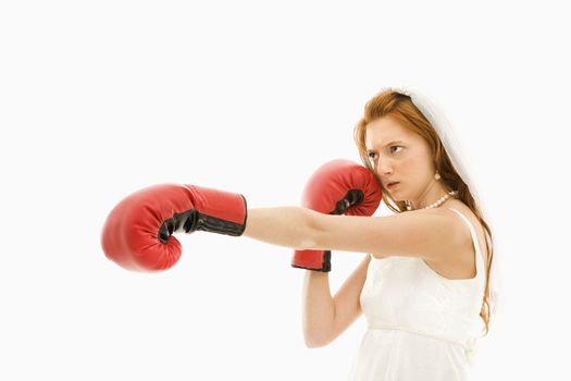 Caucasian bride with boxing gloves.
