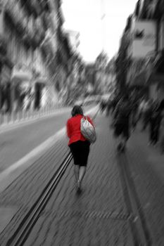 woman in red (with radial blur)