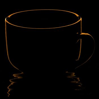 Black coffee mug rim lit in amber light to look like a graphic