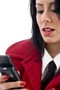 young woman reading a text message on an isolated white background