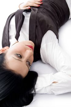 caucasian female lying down on floor with white background