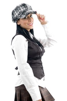 caucasian female posing wearing a cap on an isolated background
