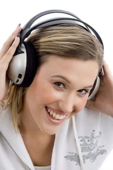 woman tuned in music with white background