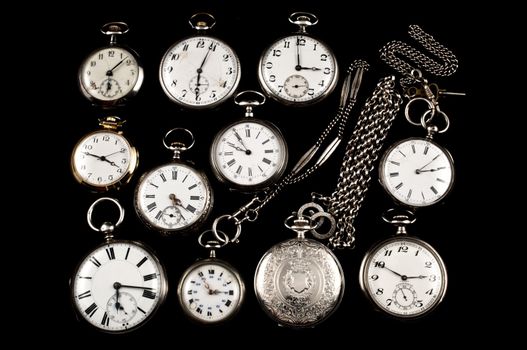 Background of cracked silver pocket watch on black