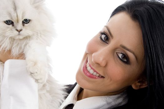 young female holding her lovable cat with white background