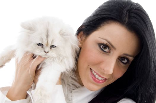 young model standing with white kitten with white background