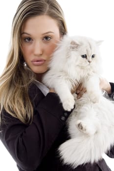 young model posing with her kitten against white background