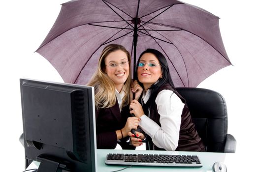 young attorney smiling and holding umbrella in office