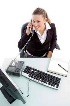 young executive talking on phone on an isolated background