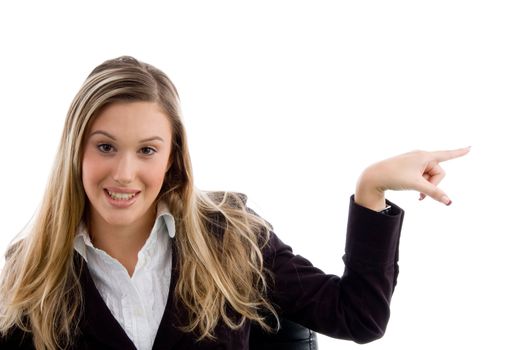 woman pointing sideways on an isolated background
