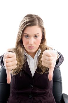 sitting female with thumbs down on an isolated white background