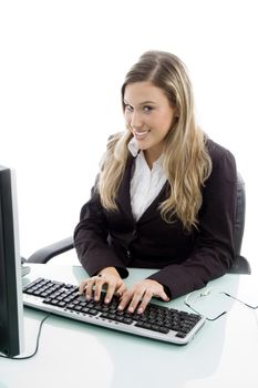 female working on computer against white background