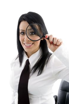 young boss looking through magnifier on an isolated white background