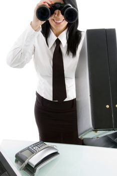 young boss looking through binocular on an isolated background